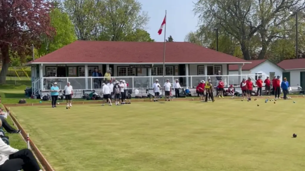 A typical lawn bowling club building and greens